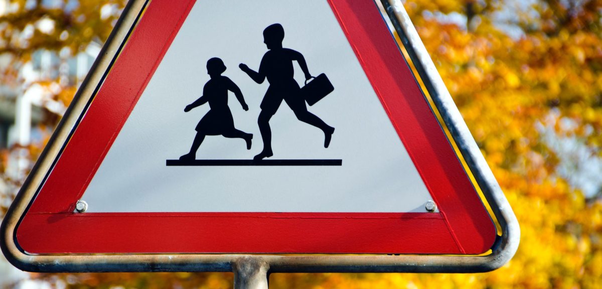 School children road safety sign