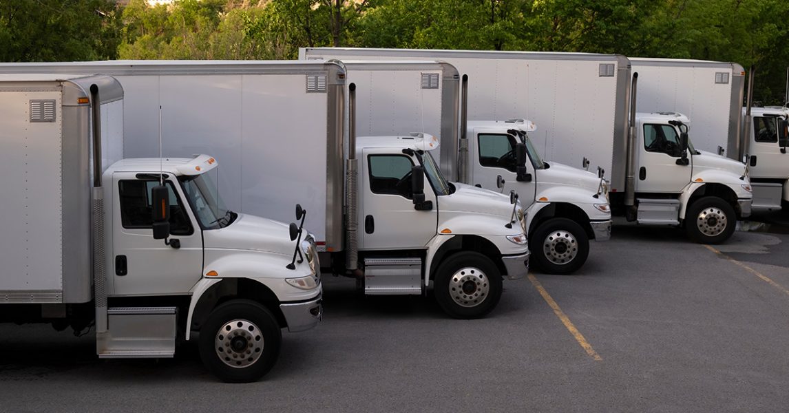 white-trucks-parking-at-the-parking-lot