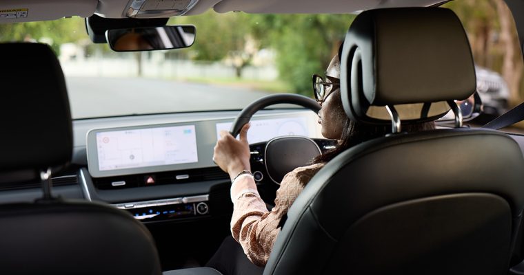 Female driver is driving on the road safety