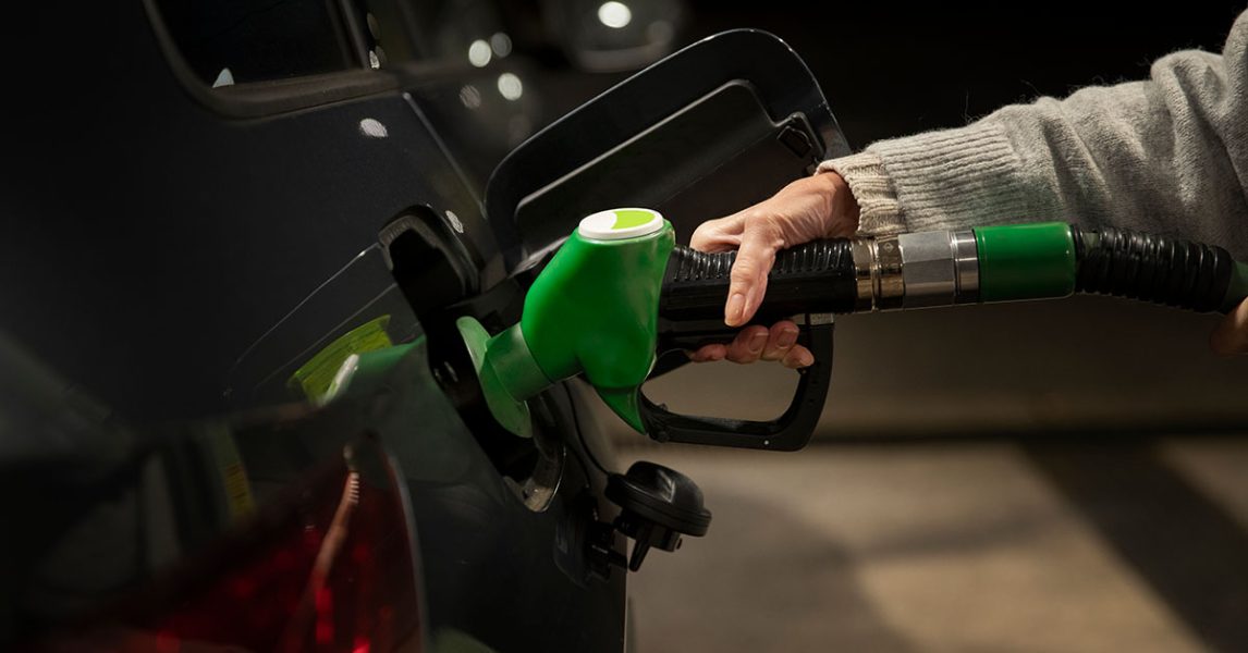 close-up-hand-holding-gas-pump