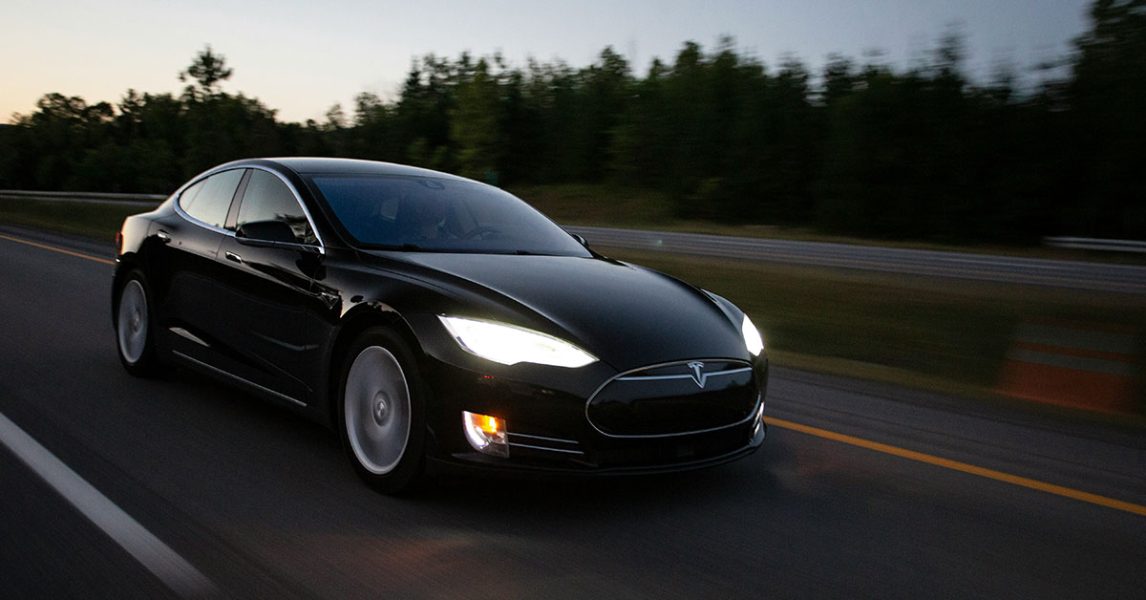 Tesla running on the road